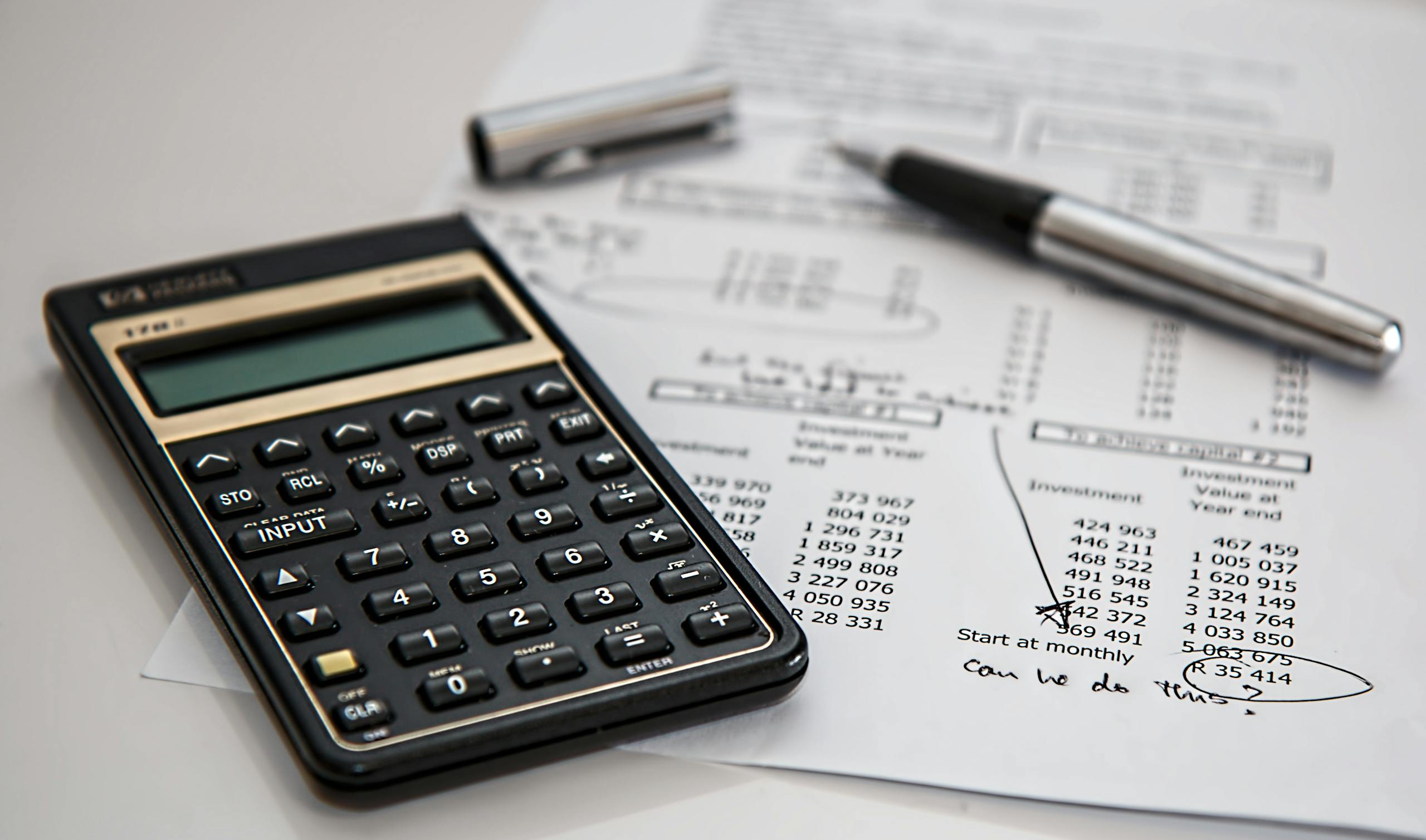 close up of financial documents with calculator and pen ideal for business management themes. 53621 scaled